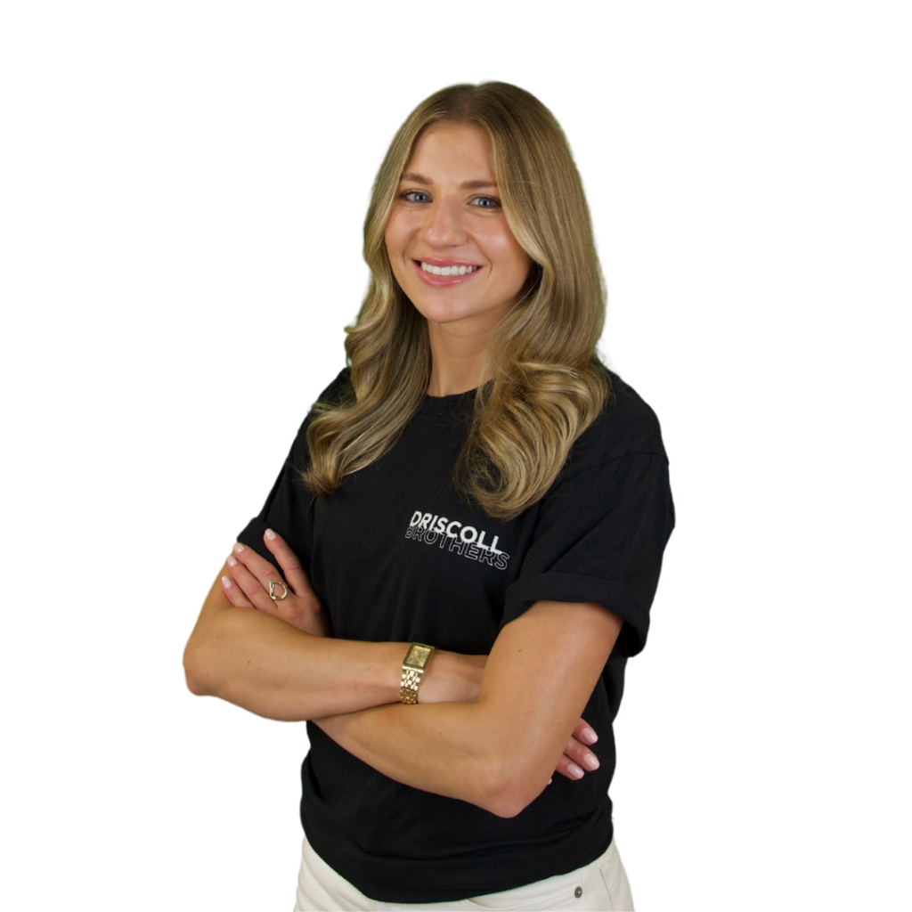 A picture of Allison stood on an angle with her arms folded