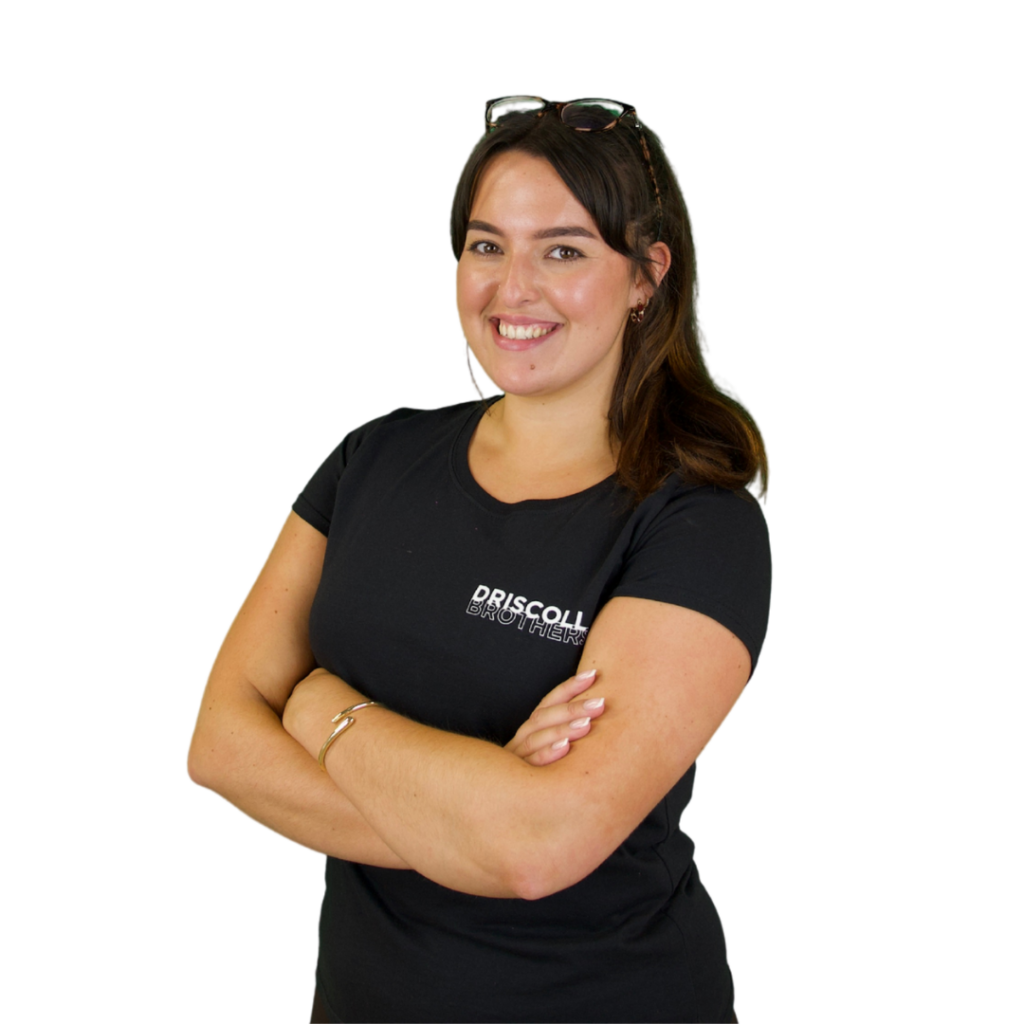 A picture of Tess stood on an angle with her arms folded